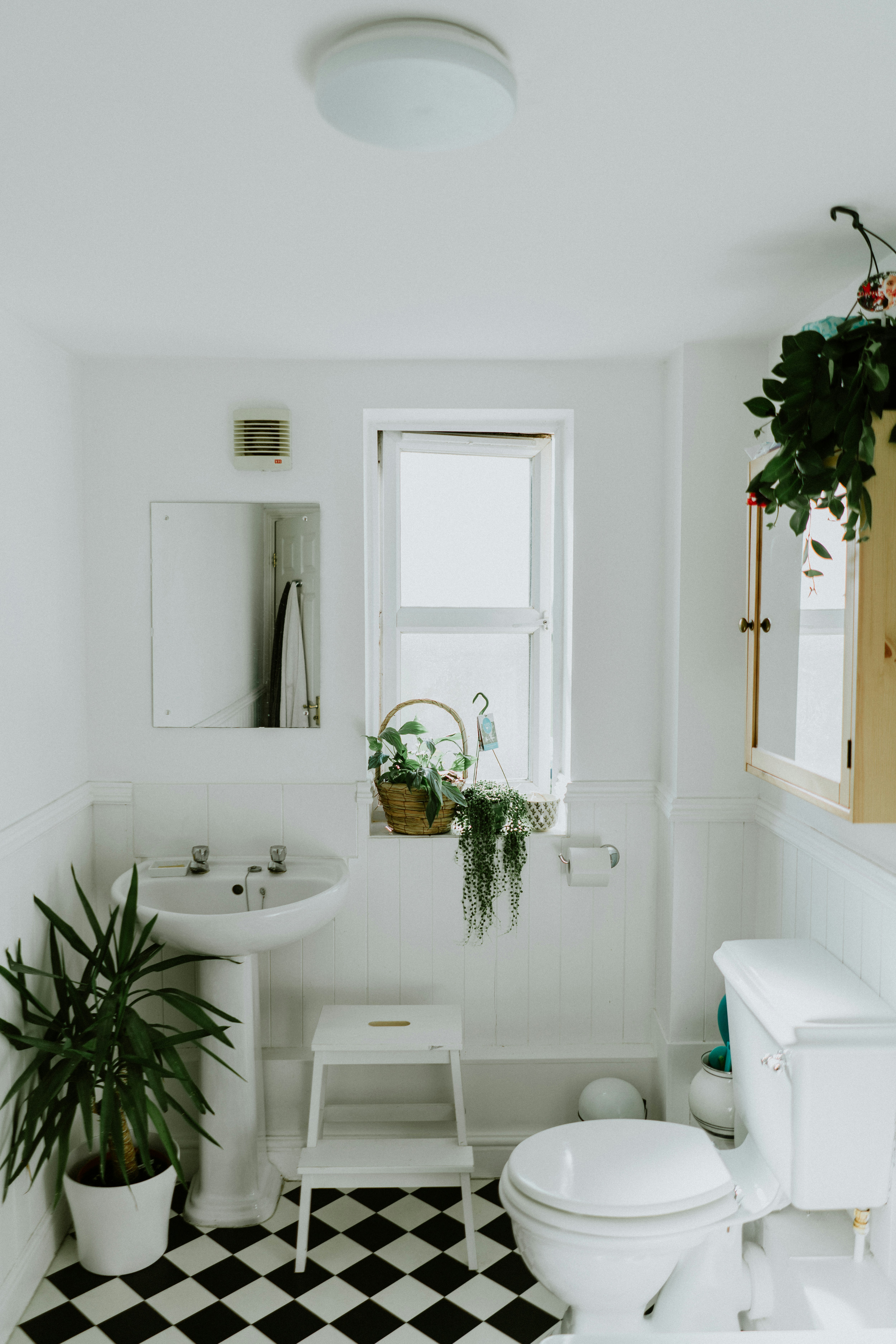 Sparkling clean white bathroom in a Montreal apartment with modern fixtures